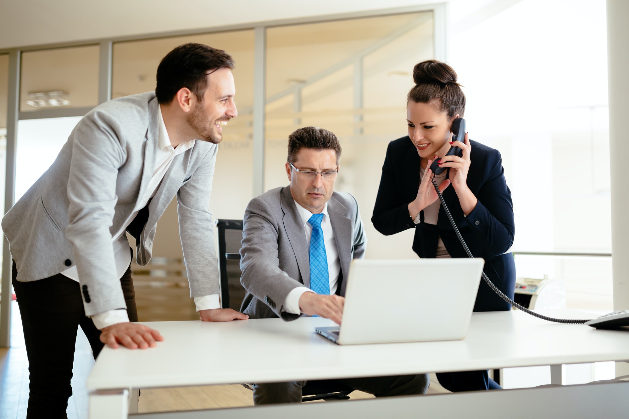 secretaries assisting boss at business outsource to increase efficiency, Outsource to Increase Efficiency? Mid-Year Review Matters